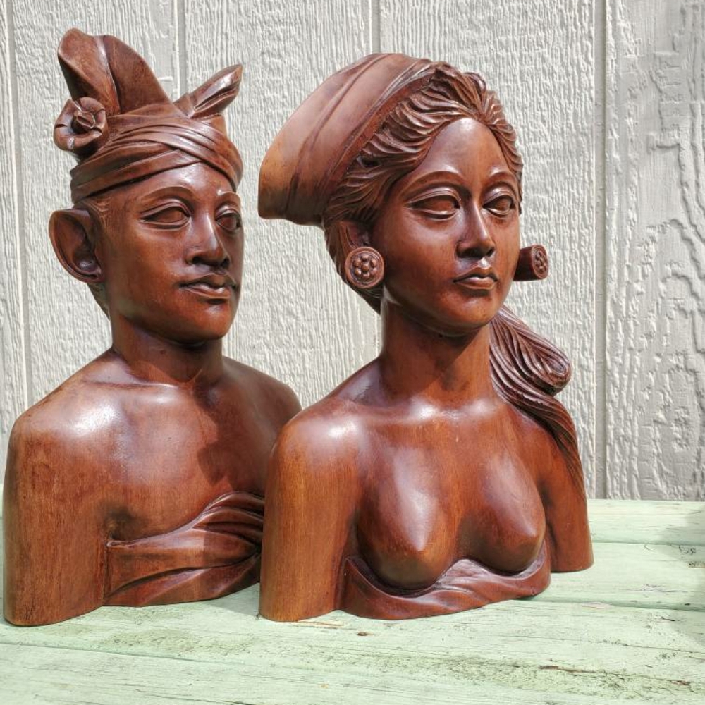 carved wood busts by A. Fatimah of Bali